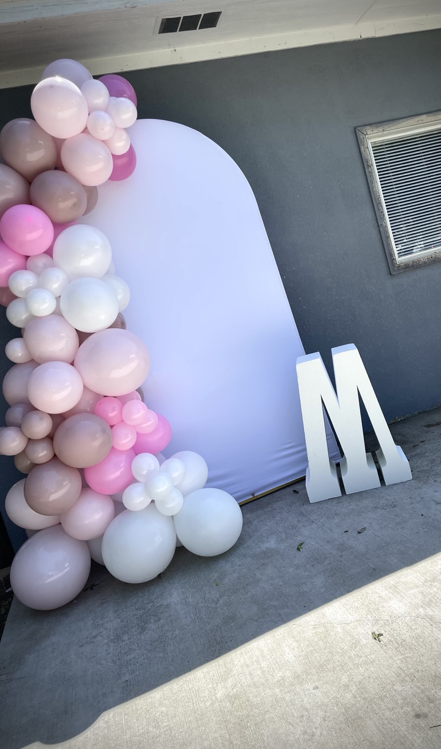 Pink backdrop balloon setup